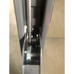 KT-4H110 four-post lift raised in a home garage with a vehicle on the runways